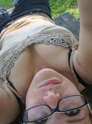 A girl with large breasts poses in clothes and then undresses. Part 2. Thumbnail 9