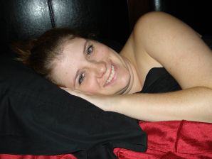 The seductive female is naked and shows a striptease, spreading her legs. Thumbnail 3