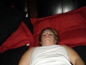 The seductive female is naked and shows a striptease, spreading her legs. Thumbnail 4
