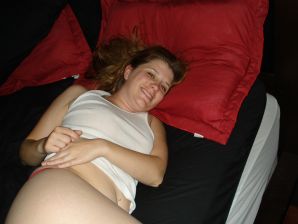 The seductive female is naked and shows a striptease, spreading her legs. Thumbnail 7