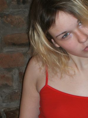 A blonde with a thin waist poses in glasses and red panties. Part 2. Thumbnail 21