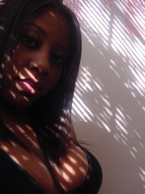 The mulatto pulls her boobs, and then spreads her legs. Thumbnail 25