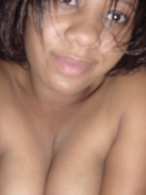 The mulatto pulls her boobs, and then spreads her legs. Thumbnail 29