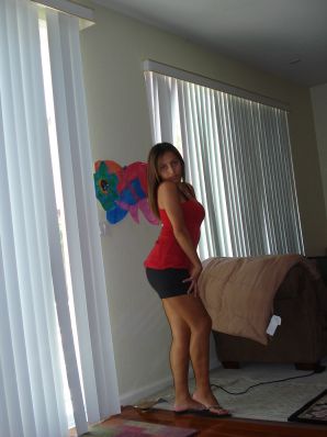 A woman with beautiful tits poses in a swimsuit and without him. Thumbnail 2
