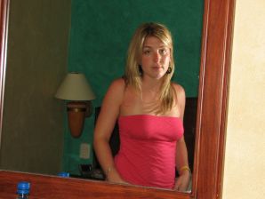 Charming blonde pulled down her blouse and bared boobs. Thumbnail 11