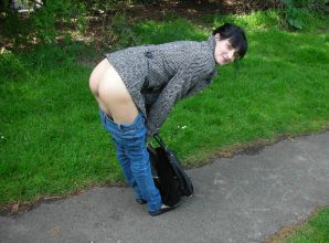 A fragile brunette shows her ass on the street and at home. Thumbnail 3
