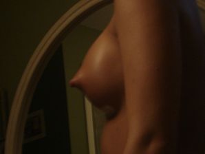 A pretty brunette drank in a bar and bared her breasts in front of a guy. Thumbnail 14