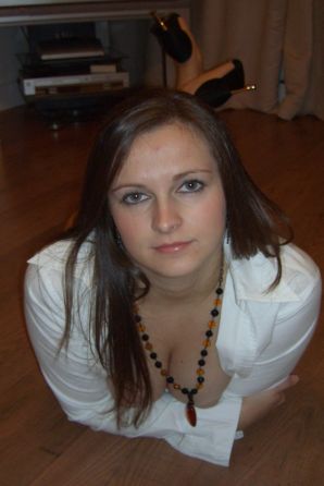 An appetizing chick lowered her panties by the fireplace. Thumbnail 4
