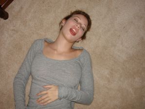 A young girl spread her legs and fingers her wet labia with her fingers. Thumbnail 10