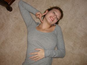 A young girl spread her legs and fingers her wet labia with her fingers. Thumbnail 11