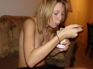 A young girl spread her legs and fingers her wet labia with her fingers. Thumbnail 30