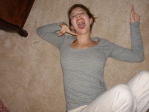 A young girl spread her legs and fingers her wet labia with her fingers. Thumbnail 9