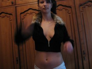 A student with a slender waist takes off her clothes on camera. Thumbnail 6