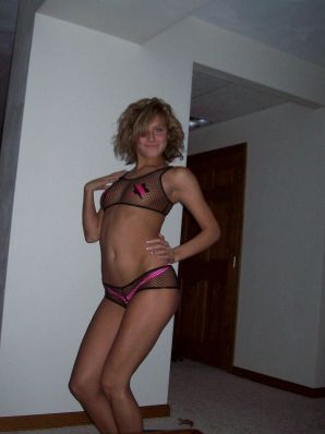 A blonde in pink lingerie slowly takes off her panties. Thumbnail 38
