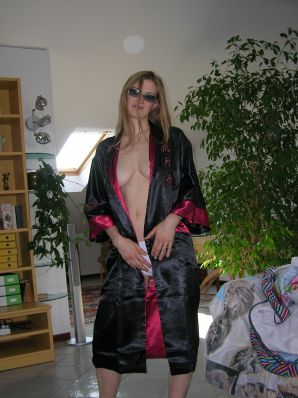 A tall blonde with wide hips undressed at home and showed tits. Part 2. Thumbnail 12