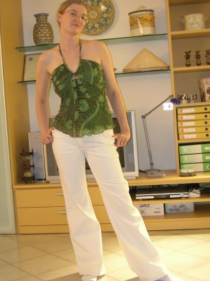A tall blonde with wide hips undressed at home and showed tits. Part 2. Thumbnail 13