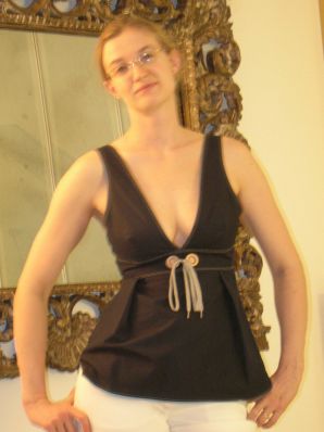 A tall blonde with wide hips undressed at home and showed tits. Part 2. Thumbnail 14