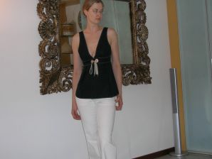 A tall blonde with wide hips undressed at home and showed tits. Part 2. Thumbnail 2