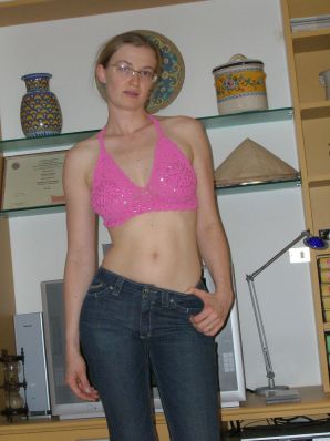A tall blonde with wide hips undressed at home and showed tits. Part 2. Thumbnail 6