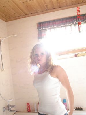 A blue-eyed minx with a pierced nipple plays with her panties. Part 2. Thumbnail 10
