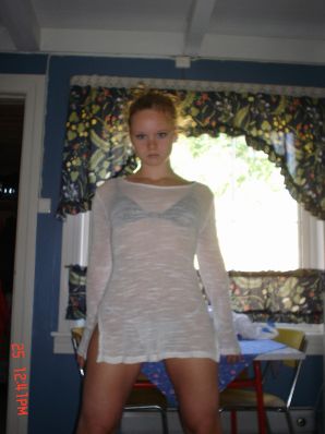 A blue-eyed minx with a pierced nipple plays with her panties. Part 2. Thumbnail 21