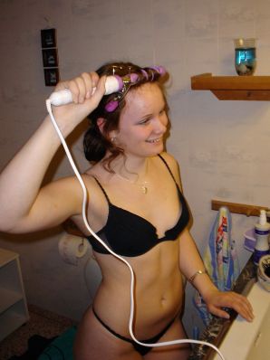 A blue-eyed minx with a pierced nipple plays with her panties. Part 2. Thumbnail 3