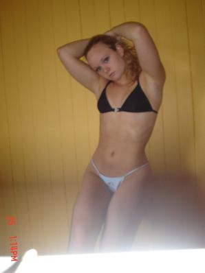 A blue-eyed minx with a pierced nipple plays with her panties. Part 2. Thumbnail 39