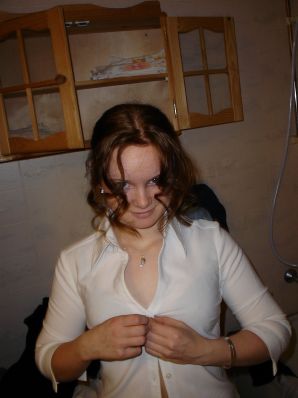 A blue-eyed minx with a pierced nipple plays with her panties. Part 2. Thumbnail 5