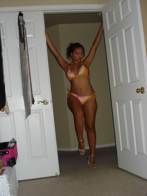 A woman with beautiful tits poses in a swimsuit and without it. Part 2. Thumbnail 18