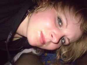 A young blonde in red lingerie stood up with cancer and spreads her pussy. Thumbnail 4