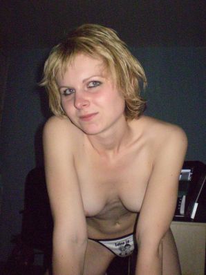 A young blonde in red lingerie stood up with cancer and spreads her pussy. Thumbnail 6