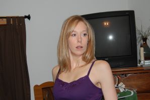 A slender woman with neat breasts takes off her clothes. Thumbnail 2