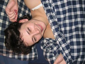 A curly-haired mature beauty is not shy about having sex on camera. Thumbnail 16