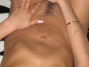 A tanned brunette with a firm body undressed and showed an intimate haircut. Thumbnail 18