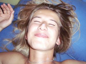A woman caresses herself spreading her legs apart on the camera. Thumbnail 38