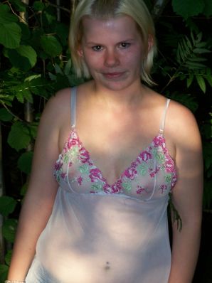 Appetizing magnificent blonde spread her legs right on the grass. Thumbnail 1
