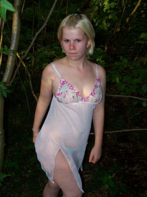 Appetizing magnificent blonde spread her legs right on the grass. Thumbnail 10