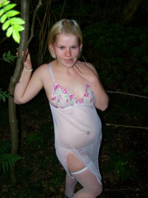 Appetizing magnificent blonde spread her legs right on the grass. Thumbnail 12
