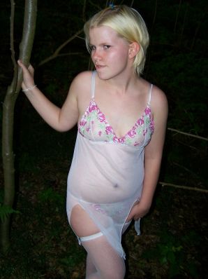 Appetizing magnificent blonde spread her legs right on the grass. Thumbnail 15