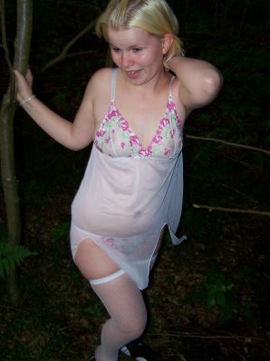 Appetizing magnificent blonde spread her legs right on the grass. Thumbnail 17