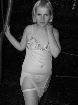 Appetizing magnificent blonde spread her legs right on the grass. Thumbnail 18