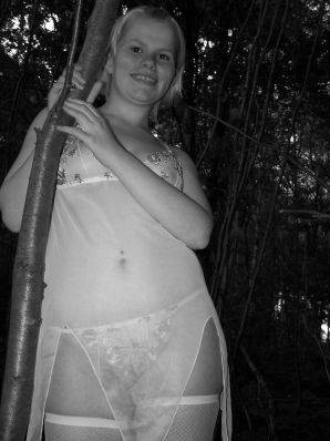 Appetizing magnificent blonde spread her legs right on the grass. Thumbnail 20