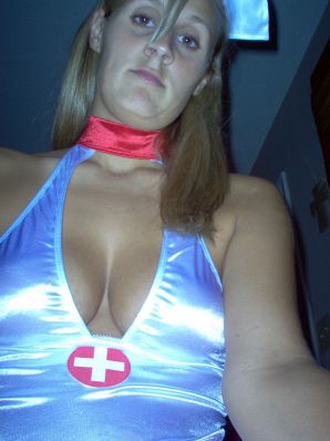 Seductive nurse masturbates on the couch. Thumbnail 32