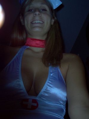 Seductive nurse masturbates on the couch. Thumbnail 33