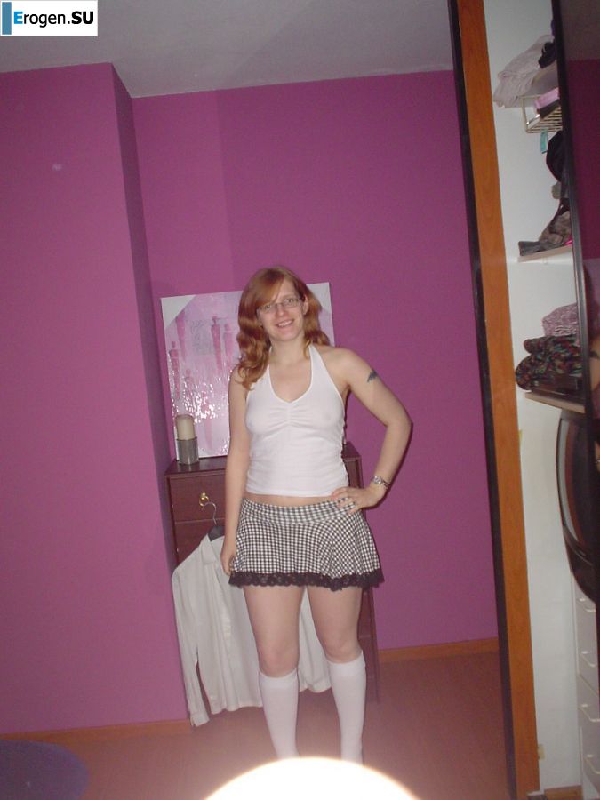 A red-haired student with glasses spread her legs in lace stockings and showed a pussy. Part 2. Slide 30