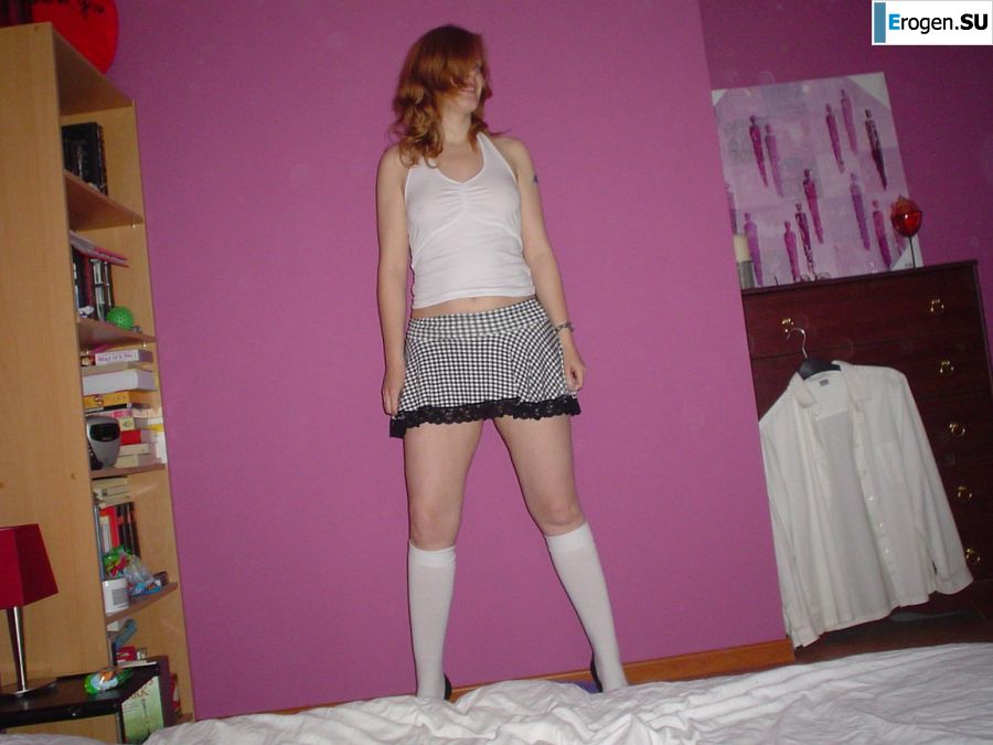 A red-haired student with glasses spread her legs in lace stockings and showed a pussy. Part 2. Slide 31