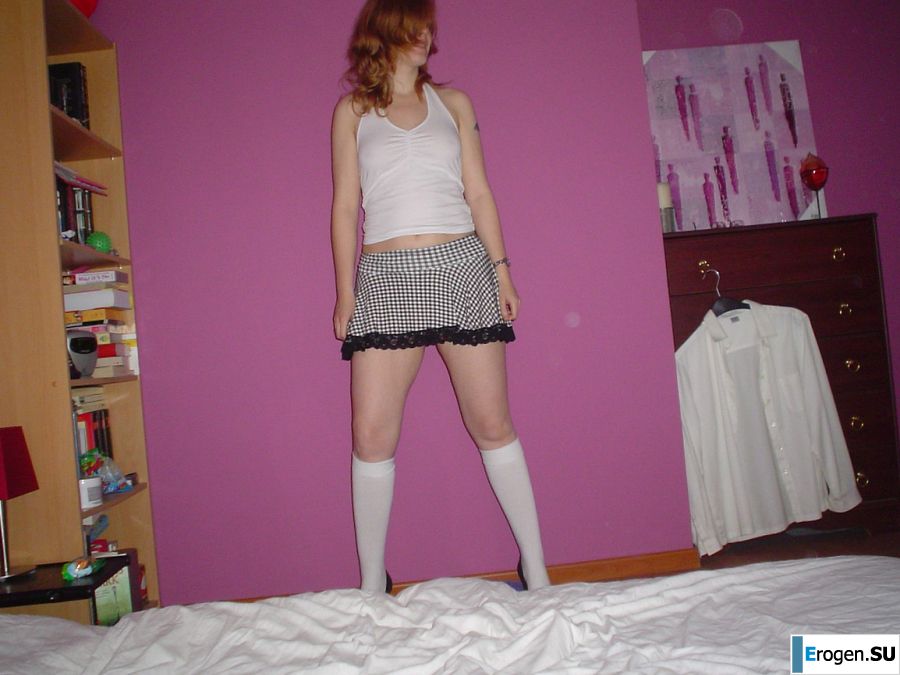 A red-haired student with glasses spread her legs in lace stockings and showed a pussy. Part 2. Slide 32