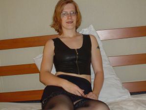 A red-haired student with glasses spread her legs in lace stockings and showed a pussy. Part 2. Thumbnail 1