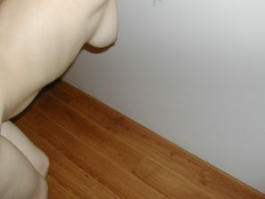 A blonde with a thin waist poses in front of her husband in the car and at home. Thumbnail 40