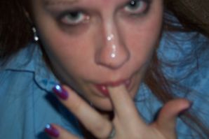 A young girl pleases herself with a finger and a pink vibrator. Thumbnail 1